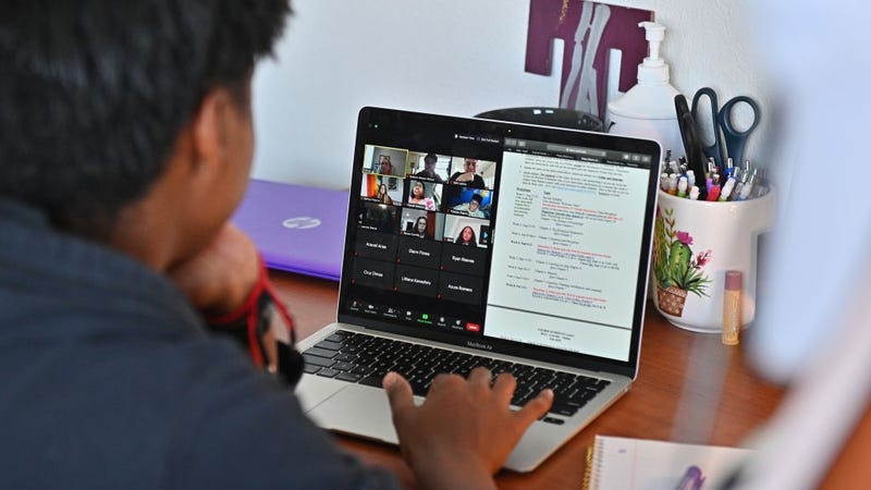  Kyalynn Moore-Wilson, a freshman, sits at a desk in her dorm room as she participates in a Zoom meeting for an 'Introduction to Psychology' course as classes begin amid the coronavirus (COVID-19) pandemic on the first day of the fall 2020 semester at the University of New Mexico on August 17, 2020 in Albuquerque, New Mexico. 