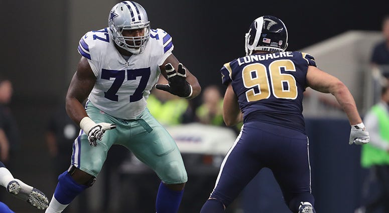Arlington, TX, USA; Dallas Cowboys tackle Tyron Smith (77) in action against the Los Angeles Rams at AT&T Stadium on Oct 1, 2017.