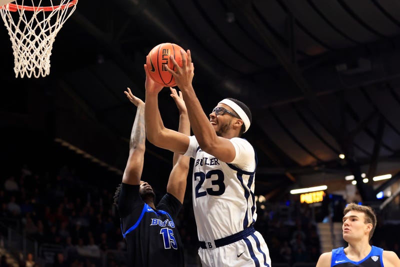 Three former UB basketball players are among those accused of participating in a point shaving scheme. The scheme also involved the Chinese professional league according to federal prosecutors. 