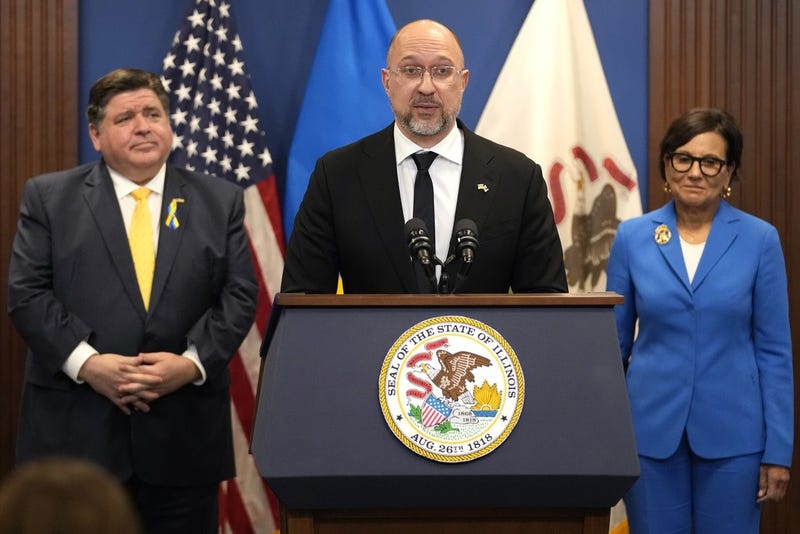 Ukraine official at lectern