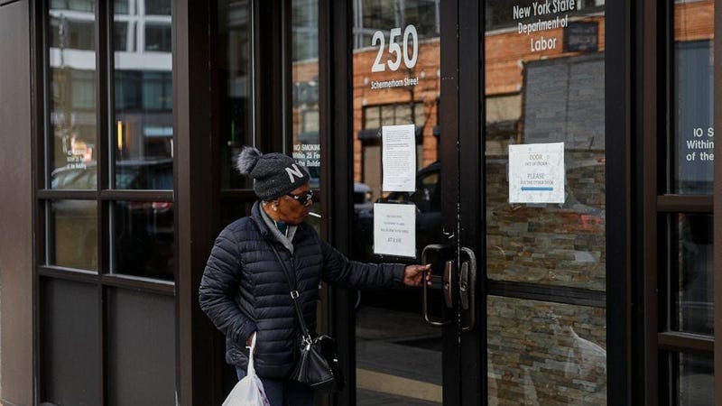 Visitors are unable to gain access to the Department of Labor due to closures over coronavirus concerns, Wednesday, March 18, 2020, in New York. 
