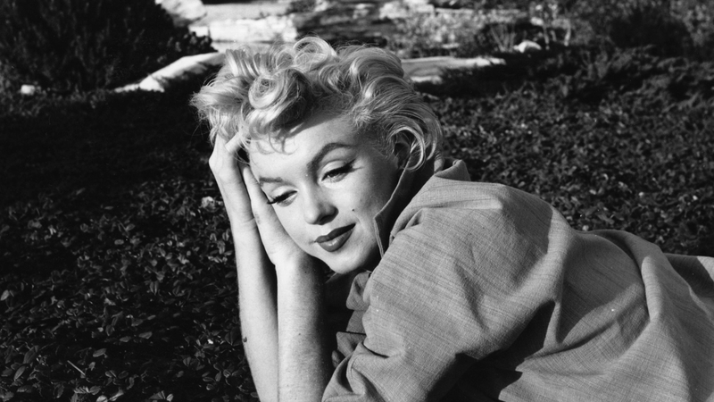 1954: A wistful Marilyn Monroe (Norma Jean Mortenson or Norma Jean Baker, 1926 - 1962).