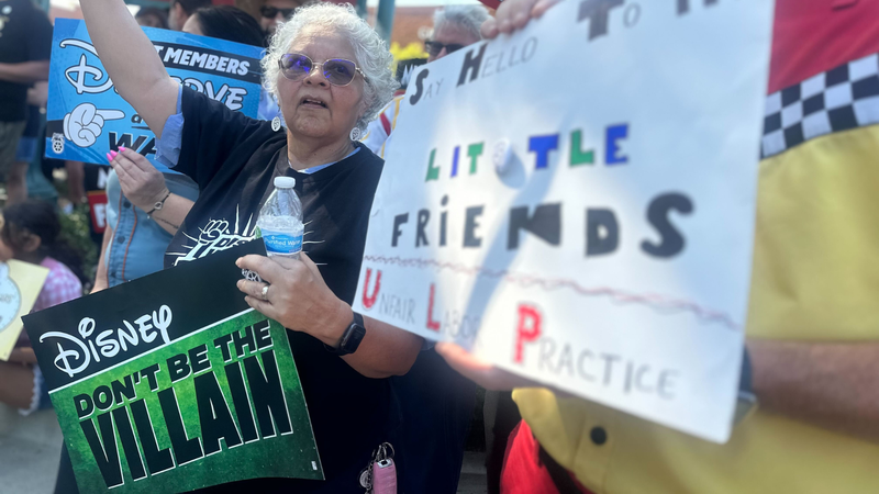 Disneyland workers march for more money