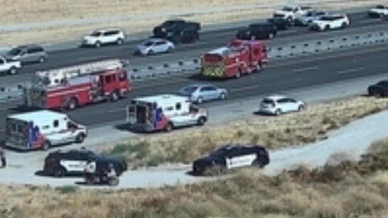 Pickup Plunges onto 215 Freeway from Overpass, Hitting SUV