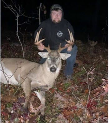 Man with buck
