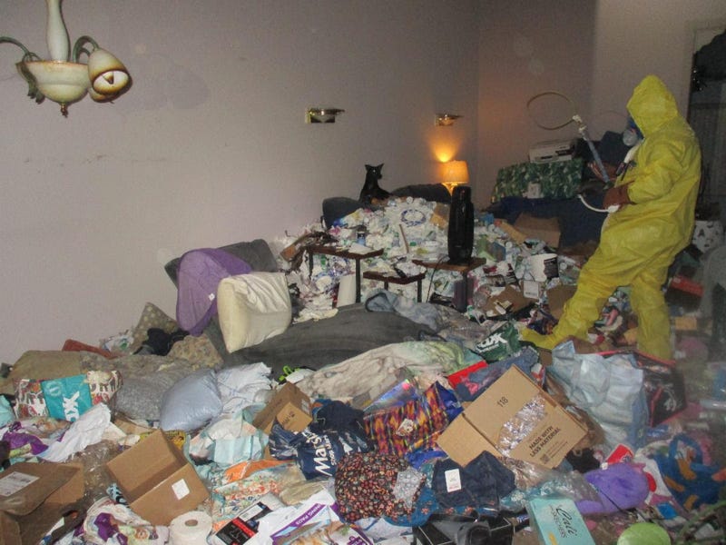 The space was overrun with garbage, feces, urine, and more unsafe debris stacked up to five feet, officials said.
