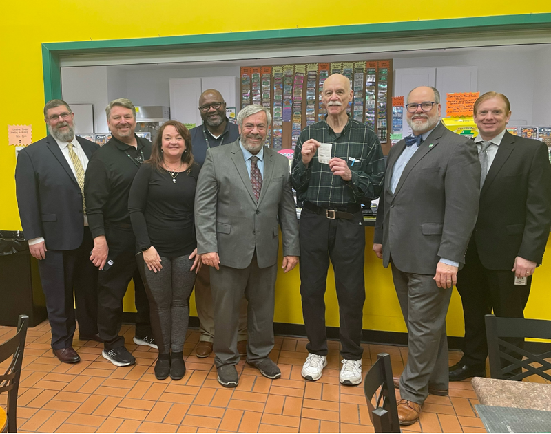 Secretary of Revenue Pat Browne and members of the Pennsylvania Lottery today visited Cue-Nique Lottery, a Lottery retailer in Harrisburg, to wish good luck to David Stevens, of Harrisburg. David was one the first Lottery players to pick up his Mega Millions® ticket after the Lottery’s new computer system came online Tuesday afternoon.