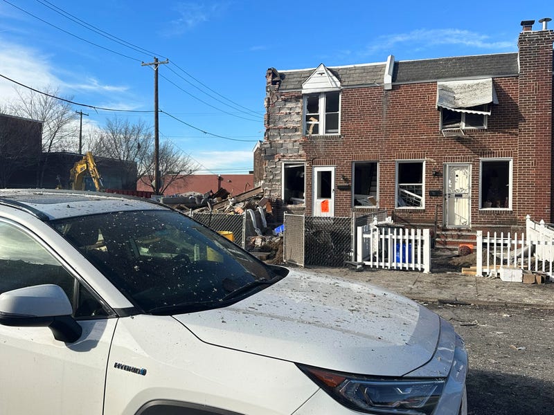 The scene of an explosion that damaged two row homes in Port Richmond in the early morning of New Year's Day.