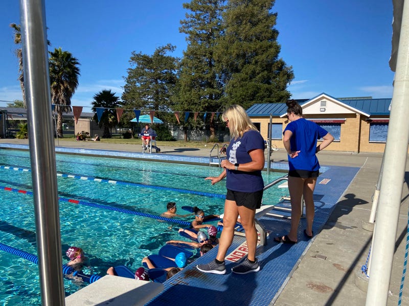 Pleasant Hill Dolfins swim coach Talli Pitcher has watched coaching change over the years, parenting too.