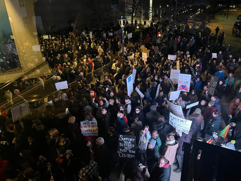 UB Students and other protestors mob outside Slee Hall on campus.