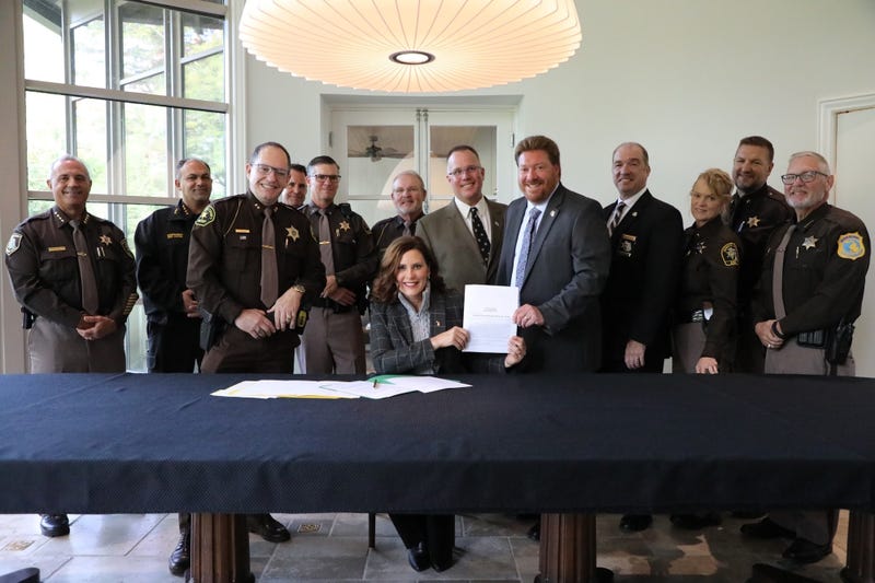 Whitmer with police officers