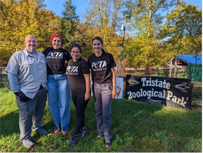 PETA and Oakland Zoo staff outside of the shutdown Tri-State Zoological Park on the last day of the five-day rescue operation.