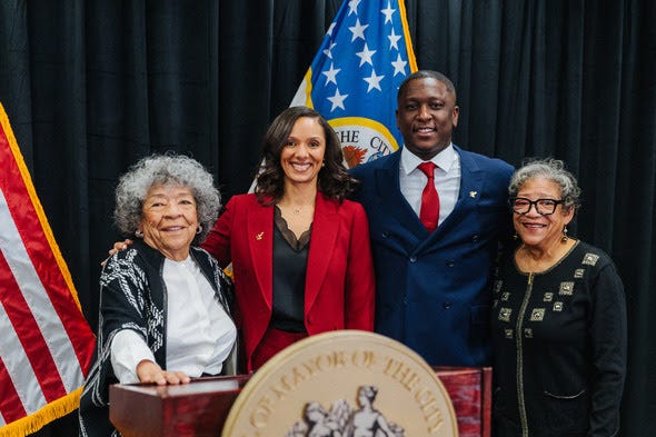 Mayor gathered with family. 