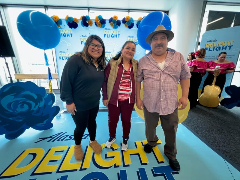 Rafael Hernandez (right) and the rest of his family at an event celebrating their all-expense paid trip to Mexico.