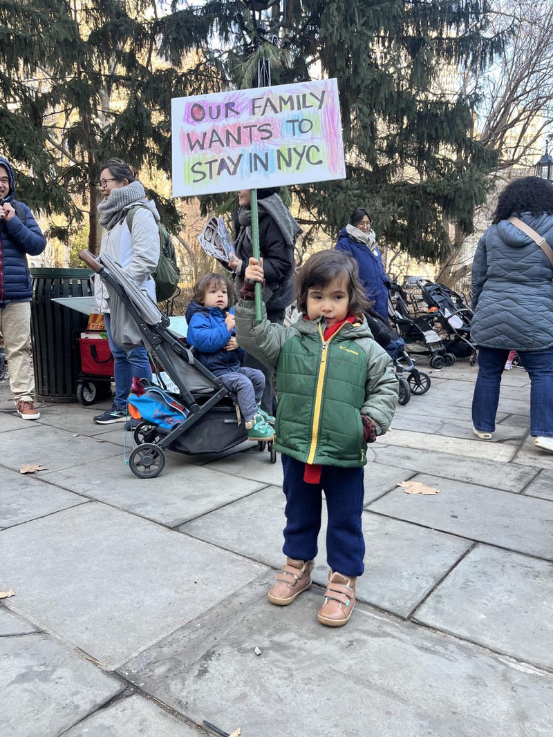Parents, toddlers and local officials march at City Hall in support of universal 2-Care in New York City on Jan. 12, 2025.