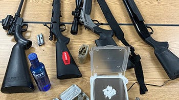 Michigan DNR officers arrest pair "out looking to hunt stuff" with firearms, alcohol, pot and meth in remote forest