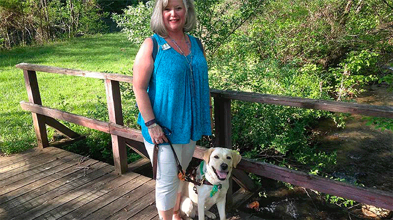 Cindy Lou Altman and her guide dog, Crystal.