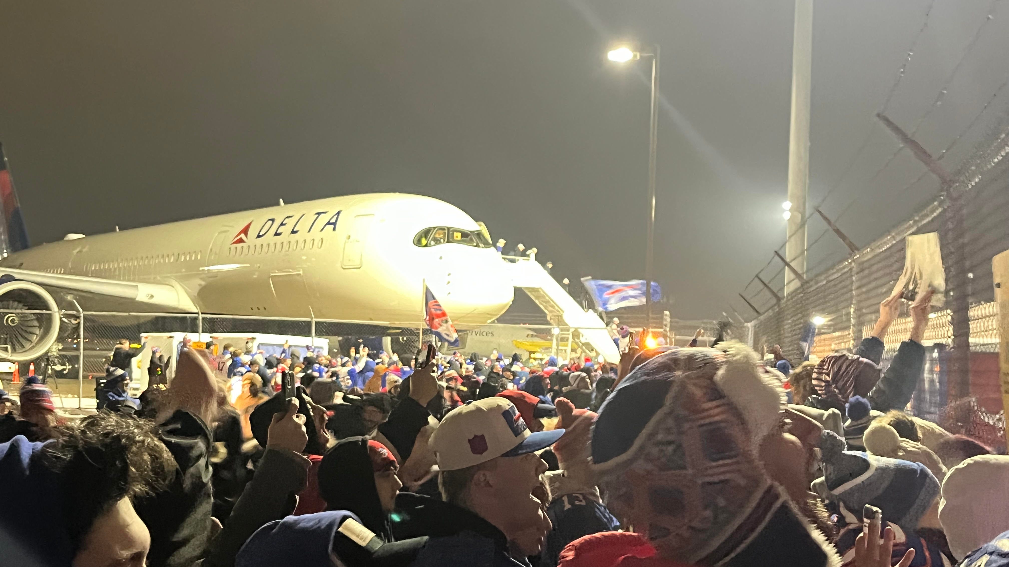 'It's our year!' 'Bills Mafia' welcomes home AFC East champions at airport Monday morning