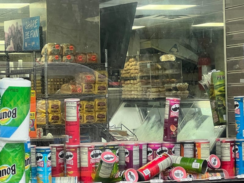 Two men were pronounced dead at the scene after they were shot in a deli on Loring Avenue on Monday night. The investigation continued Tuesday morning