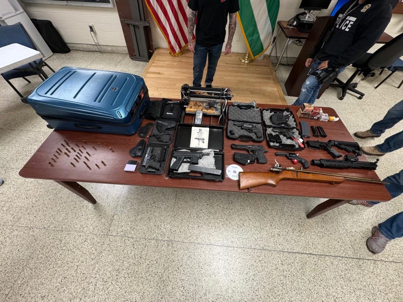 Moore is accused of selling over $8,000 in guns to the operative.