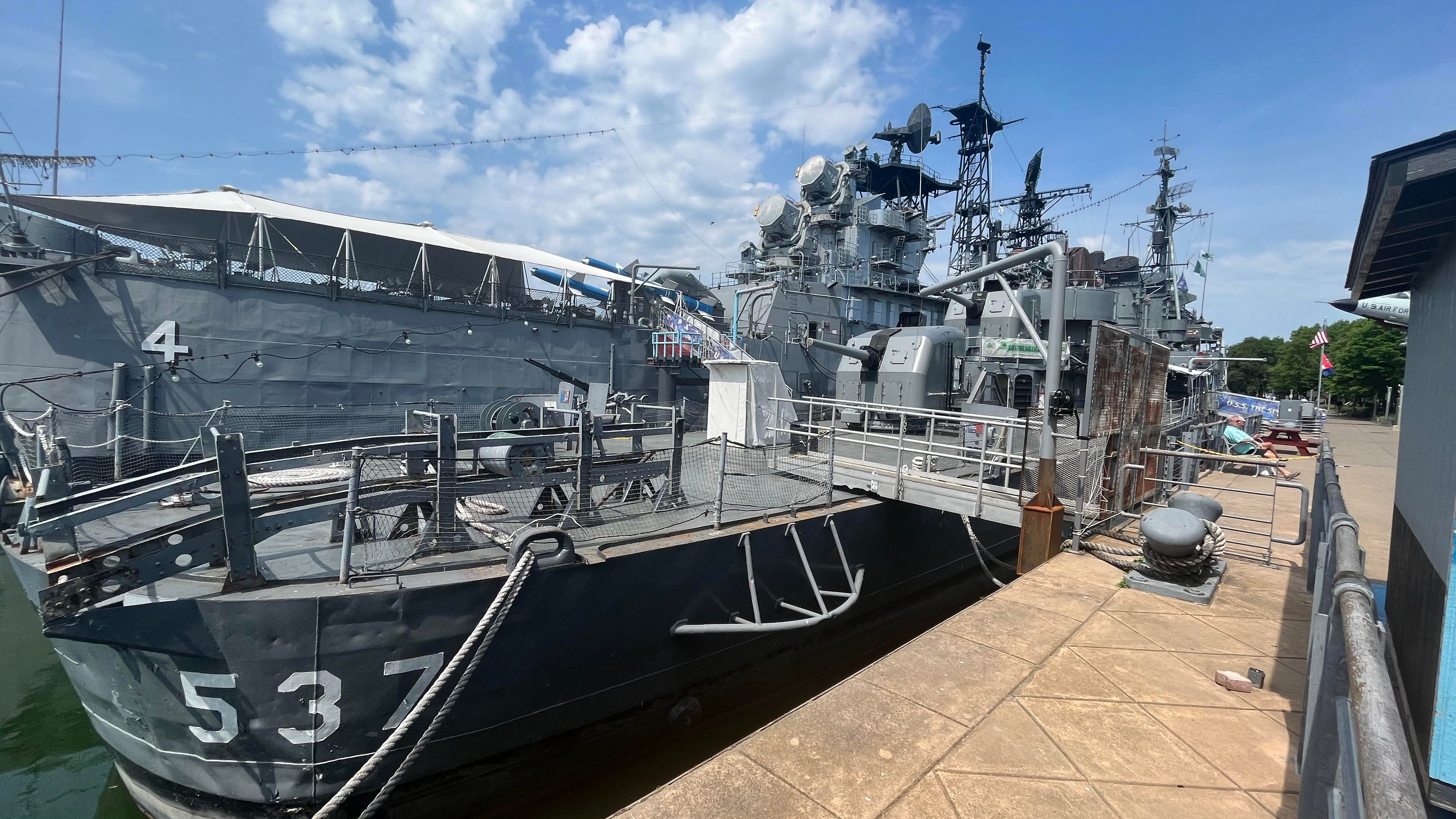 Naval surveyor report completed, submitted for future permanent repairs for USS The Sullivans