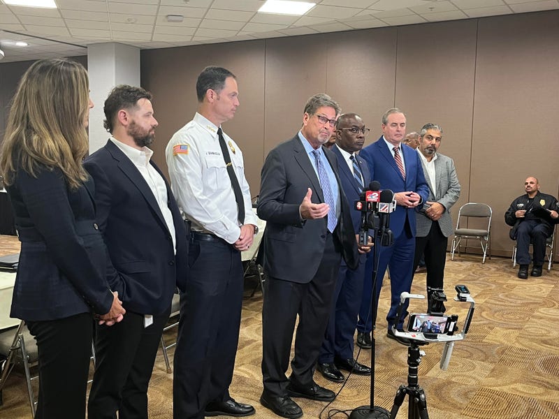 Clark Kimerer, a facilitator for the Center for Homeland Defense and Security at the Naval Postgraduate School, stands with Buffalo and Erie County officials explaining the goal and purpose of the emergency preparedness seminar.