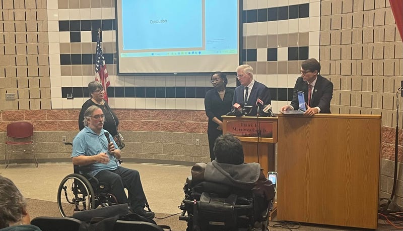 Todd Varrwerk responds to a question on improving public transit in Western New York at the Frank E. Merriweather Library.