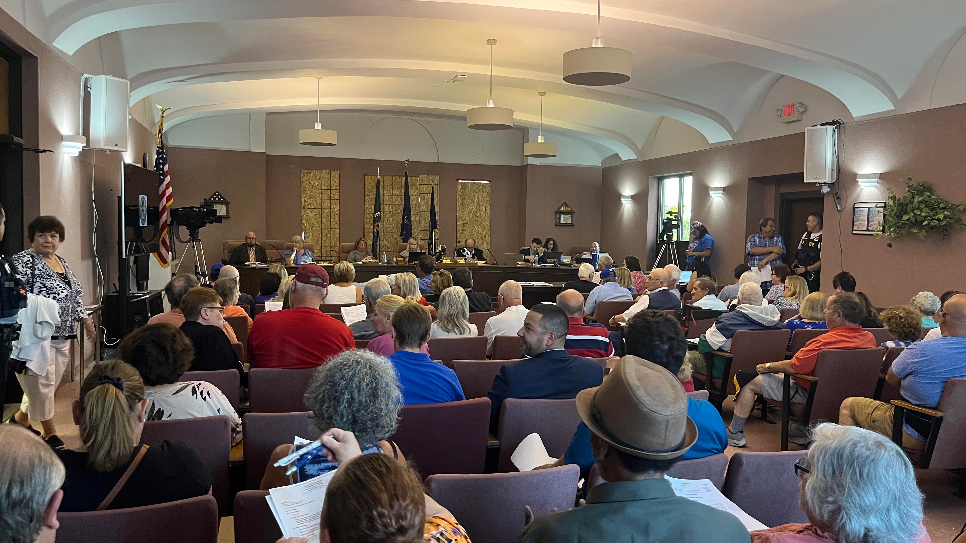 Cheektowaga residents pack meeting as asylum seekers to be moved out of hotel
