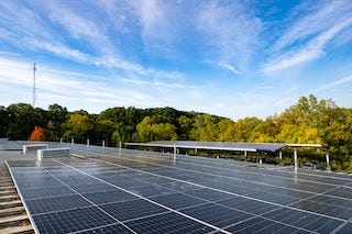 A rooftop filled with solar panels