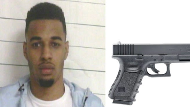 Man arrested for bringing a gun to a Mardi Gras parade
