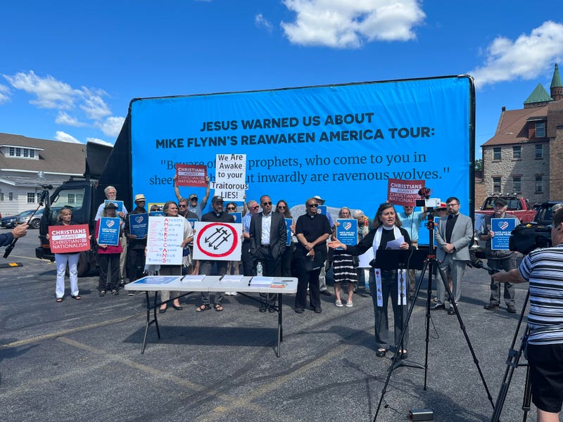 Religious protestors protesting Christian nationalism and the ReAwaken America tour in Batavia, N.Y.