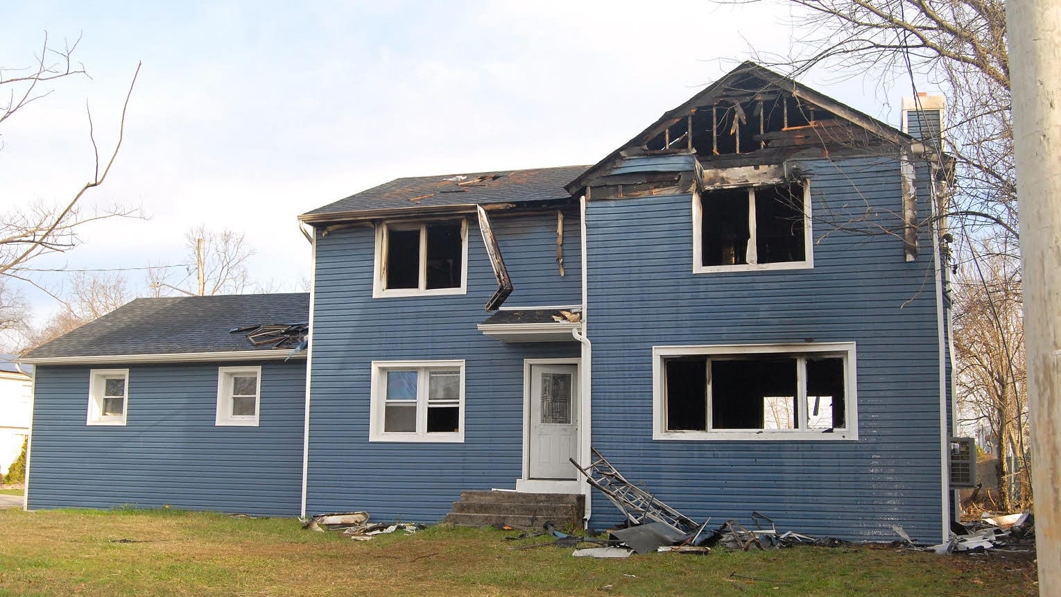 PHOTOS: Suffolk County Police probing suspected arson in East Farmingdale
