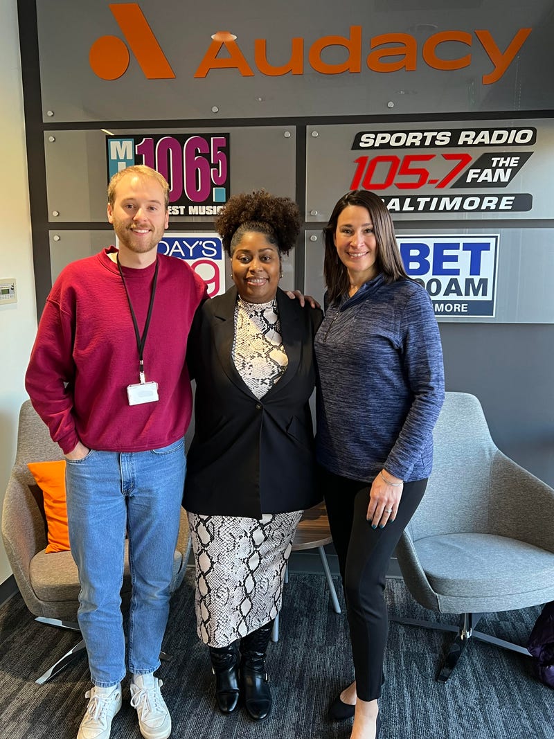 Joi Robinson and Sara Johnson with Ben Carpenter