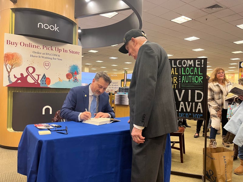 David Bellavia at Barnes and Noble signing a book for a Vietnam veteran.