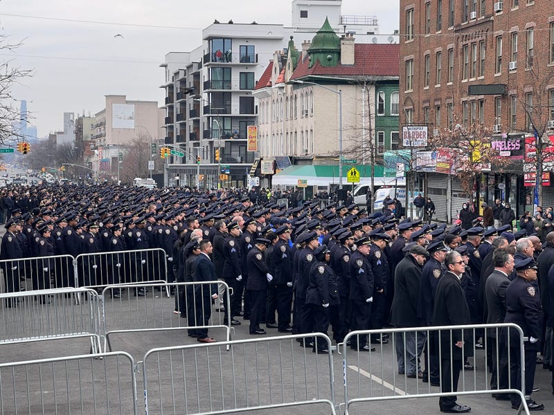 Police officers at the funeral for Officer Adeed Fayaz on Thursday
