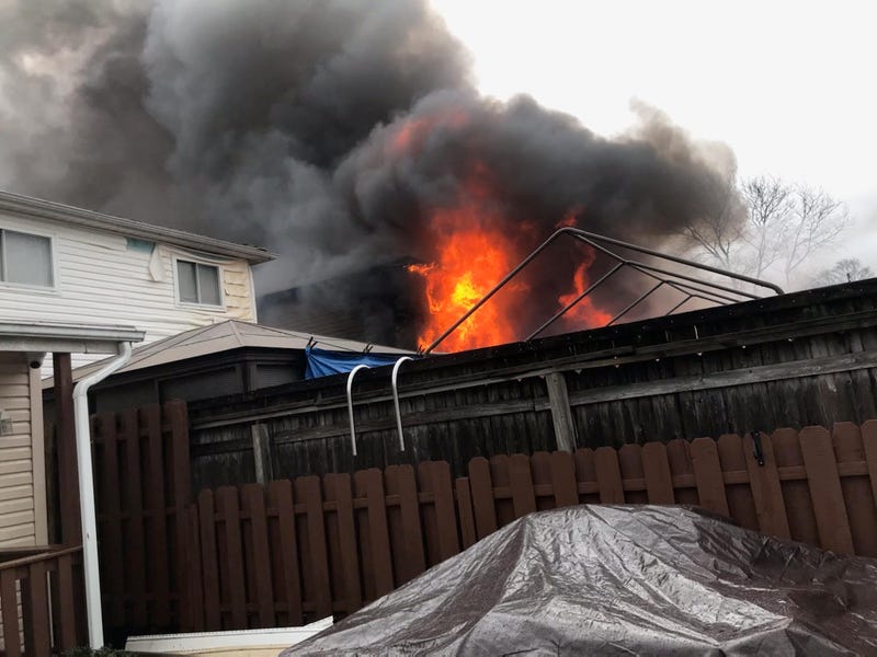Flames tore through the home at 88 Shotwell Ave. around 1:30 p.m