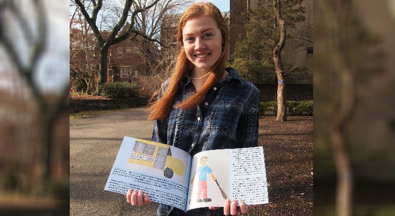 Rebecca Smith holding her book, "Does He Still Love Me?"