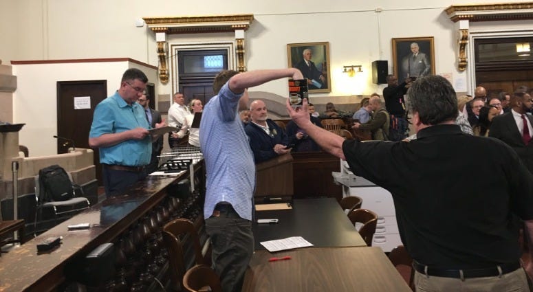 Candidates for Philadelphia city offices pick ballot positions for the May primary by picking raffle balls out of a Horn and Hardart coffee can. When a candidate isn't present and hasn't assigned a proxy, a civil servant picks from the can.