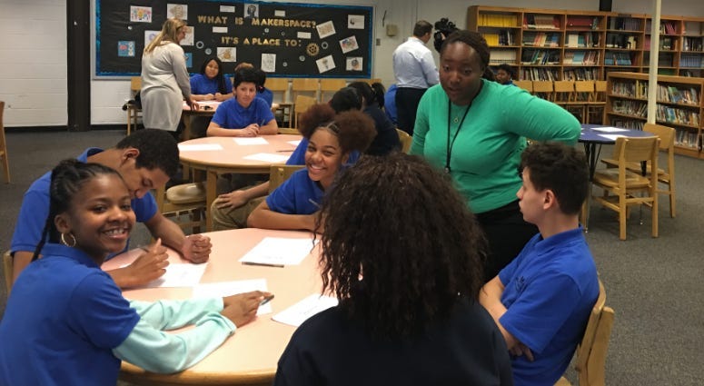 Mastery East Camden Charter School Principal Meaghann Lawson engages with students during a presentation on engineering as a career path.