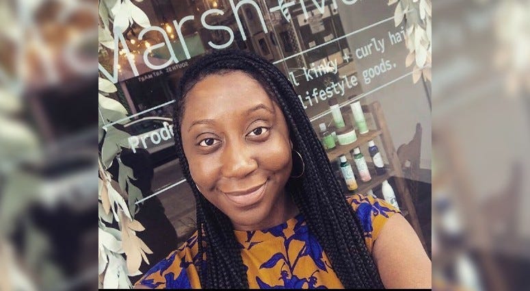 Jenea Robinson in front of her store, Marsh and Mane