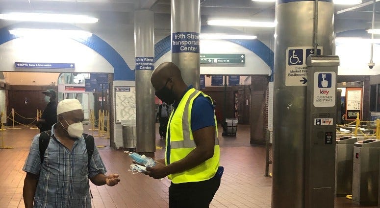 SEPTA social distancing coaches talking to riders
