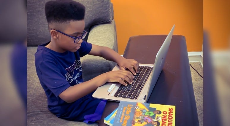 8-year-old David Oplacio participating in The Reading Coaches