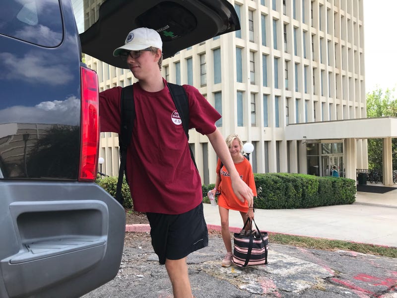 Students at the University of South Carolina pack up Wednesday, Sept. 12, 2018, to head home in Greenville late Wednesday morning after the announcement that classes are canceled through Saturday.