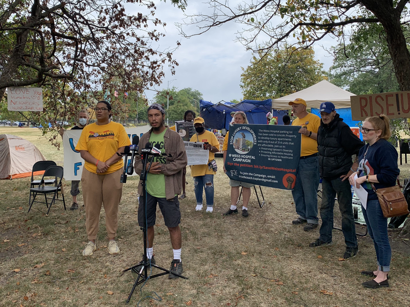 Homeless advocates rally in a field