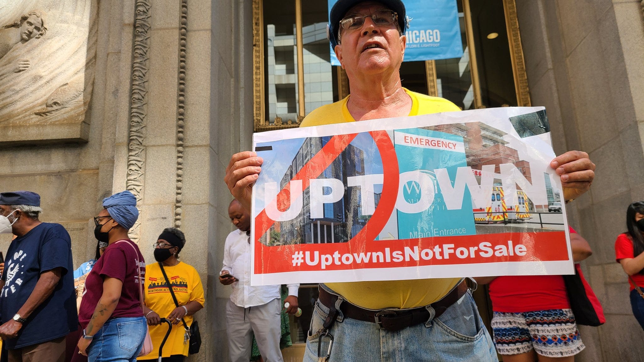 Uptown activists take fight against luxury apartments to City Hall