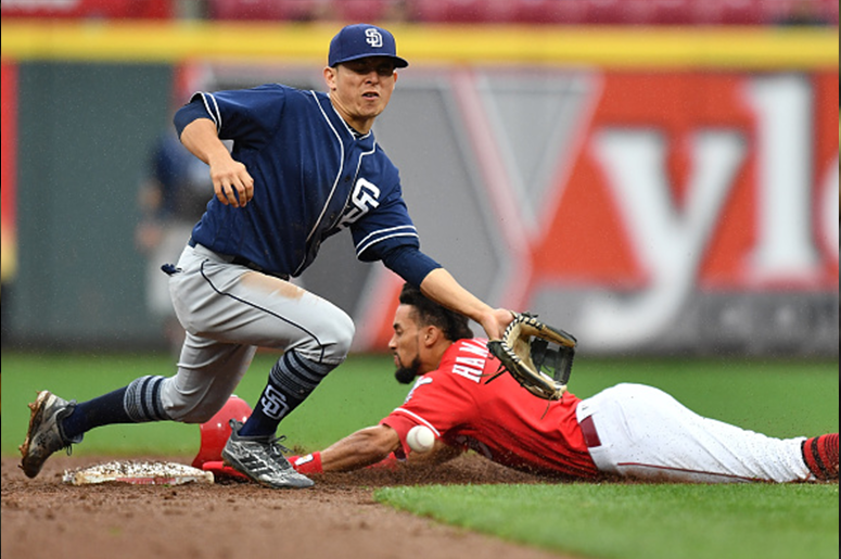 CINCINNATI, OH - SEPTEMBER 9: Luis Urias #9 of the San Diego Padres bobbles the throw as Billy Hamilton #6 of the Cincinnati Reds steals second base in the sixth inning at Great American Ball Park on September 9, 2018 in Cincinnati, Ohio. (Photo by Jamie 