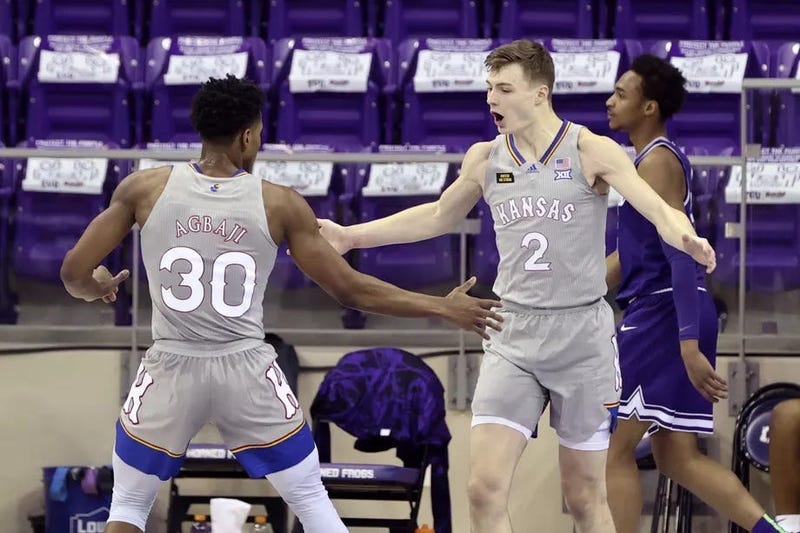 Jayhawks win in Texas, Wildcats lose in Texas