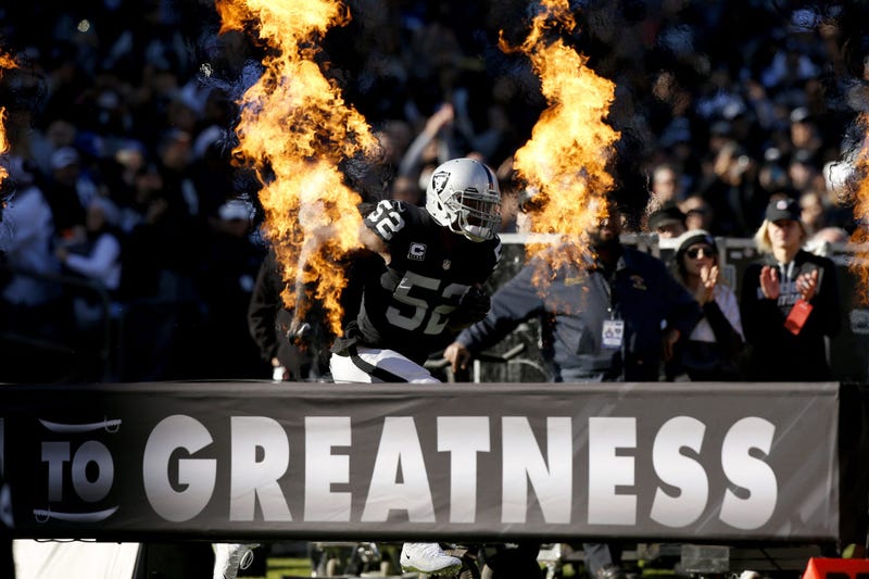 Oakland Raiders defensive end Khalil Mack (52) is introduced before the start of the game against the New York Giants at Oakland Coliseum.