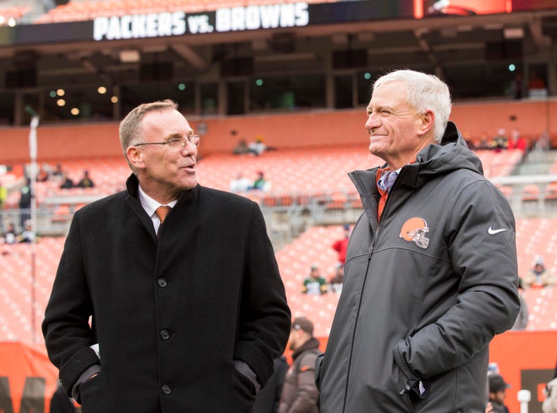 Cleveland, OH, USA; Cleveland Browns general manager John Dorsey, left, talks with team owner Jimmy Haslam during warmups before the game against the Green Bay Packers at FirstEnergy Stadium