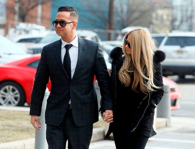 January 19, 2018; Newark , NJ, USA; Mike 'The Situation' Sorrentino, breakout star of MTV's Jersey Shore enters the US Federal Courthouse in Newark with girlfriend Lauren Pesce. Sorrentino wrote to a judge that he will plead guilty today to federal tax ch
